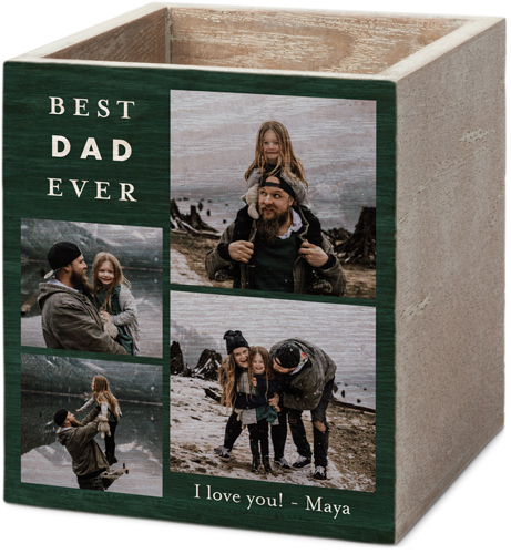 A wooden pen and pencil holder with photos and text on the front